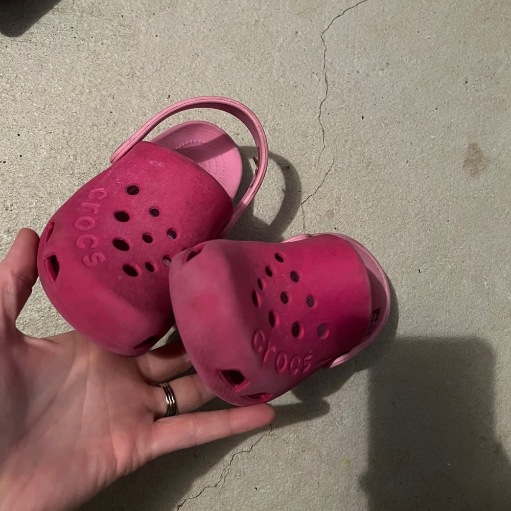 Pink crocs.